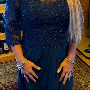 Worn once to my daughter’s wedding!! Beautiful beaded navy dress.